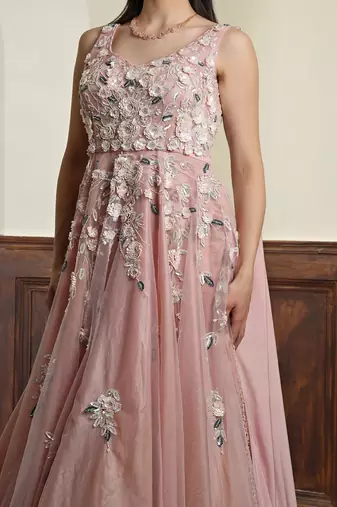 nude pink net gown with opaque sequin embellishment