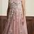Nude pink net gown with opaque sequins work