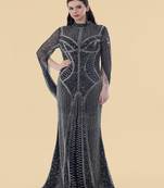 dark blue net backtrail gown with heavy beadwork