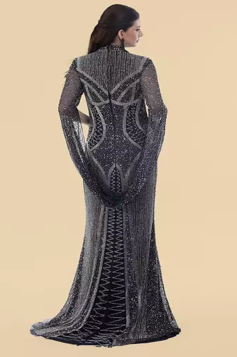 dark blue net backtrail gown with heavy beadwork