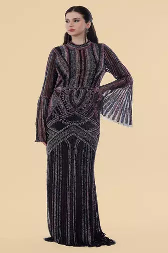 Black net backtrail gown with heavy beadwork