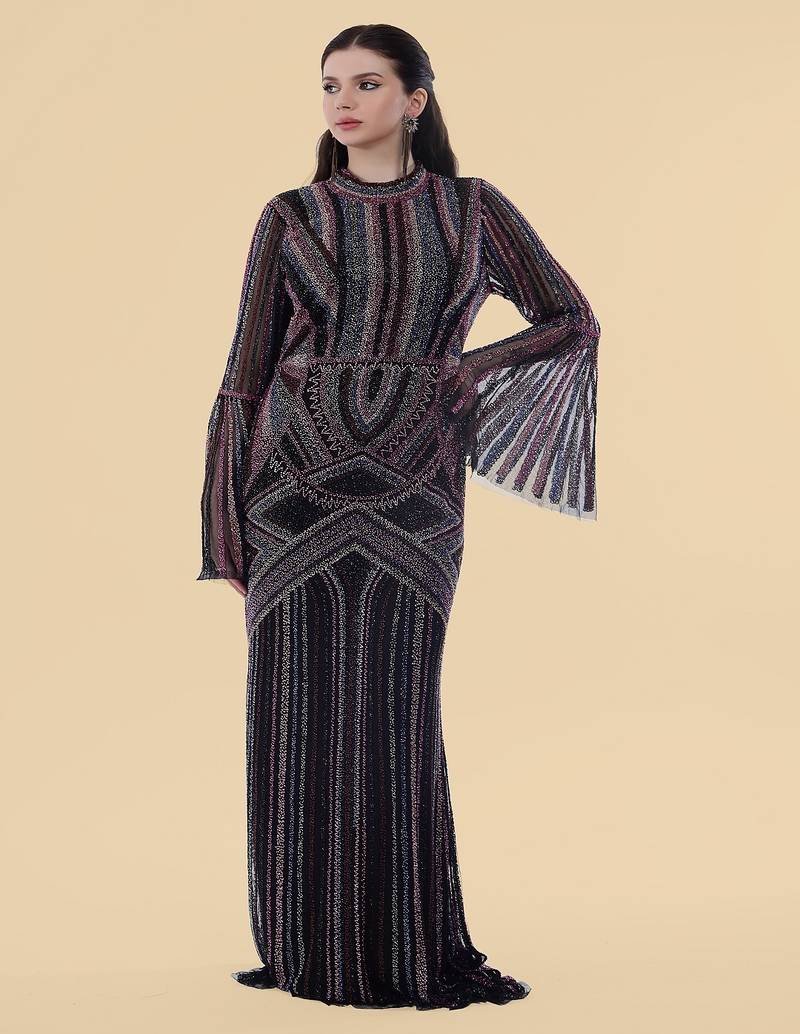 Black net backtrail gown with heavy beadwork