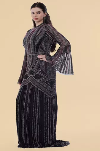 black net backtrail gown with heavy beadwork