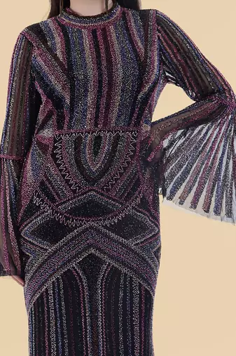 black net backtrail gown with heavy beadwork
