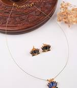Minimal blue lotus motif pendant set with invisible chain
