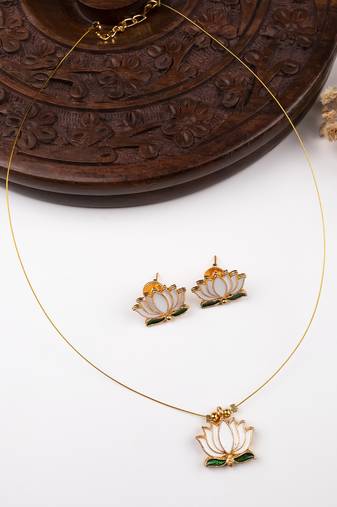 Minimal white lotus motif pendant set with invisible chain