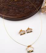 Minimal white lotus motif pendant set with invisible chain