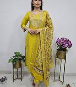 golden yellow cotton silk embroidered salwar suit with floral printed dupatta