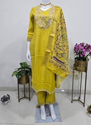 golden yellow cotton silk embroidered salwar suit with floral printed dupatta 4