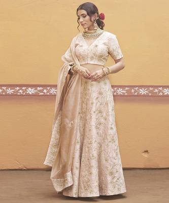 white silk gold embroidered wedding a-line lehenga 4