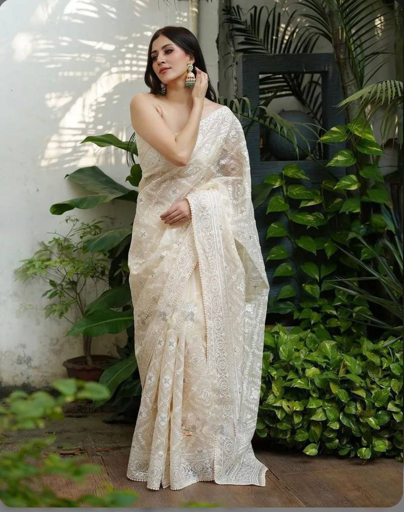 off white organza silk saree with elegant embroidery