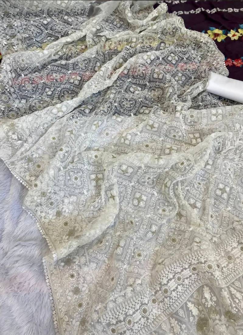 off white organza silk saree with elegant embroidery