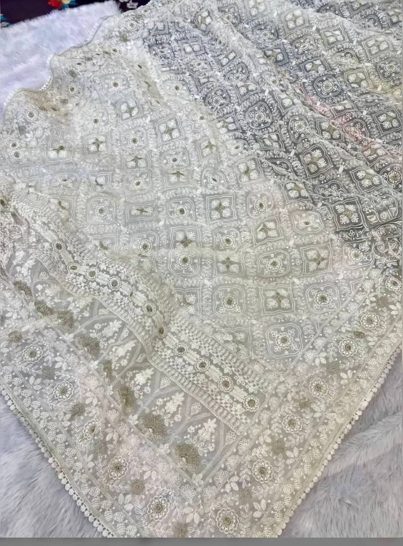 off white organza silk saree with elegant embroidery