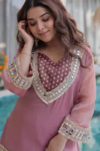 peach chinnon kurta pant with mirror and lace work