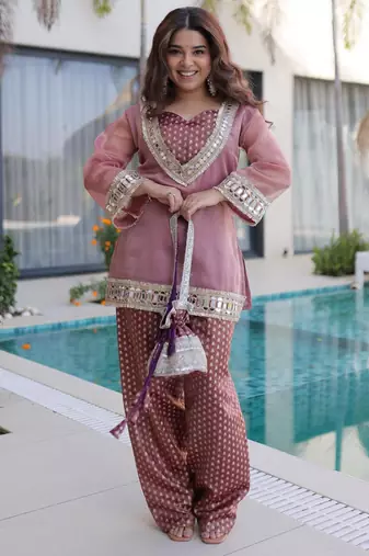 peach chinnon kurta pant with mirror and lace work