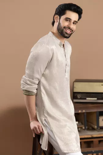 ivory tissue kurta pajama with embroidered work