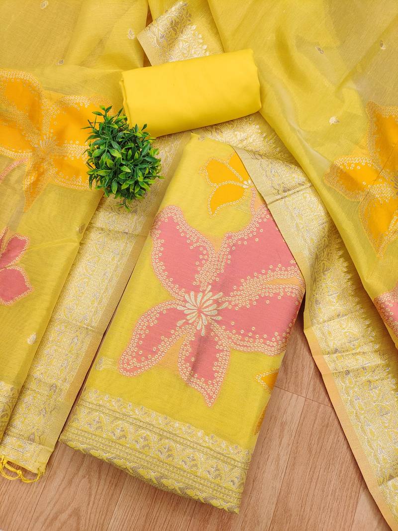 yellow shimmer dress material with zari weaving