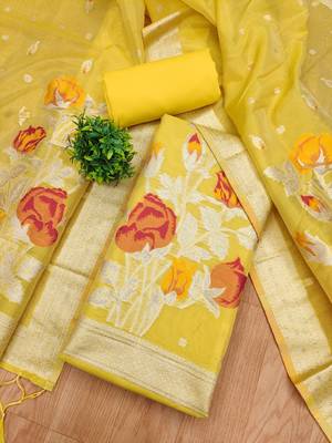yellow shimmer dress material with zari  1