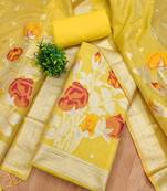 yellow shimmer dress material with zari weaving