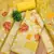 yellow shimmer dress material with zari 
