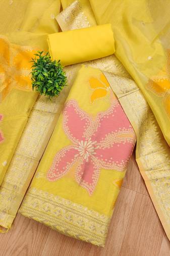 yellow shimmer dress material with zari weaving
