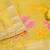yellow shimmer dress material with zari weaving