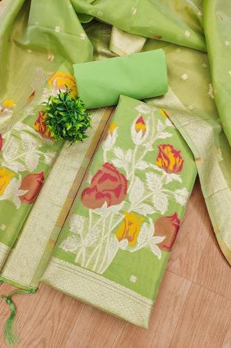 green shimmer dress material with zari weaving