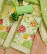 green shimmer dress material with zari weaving