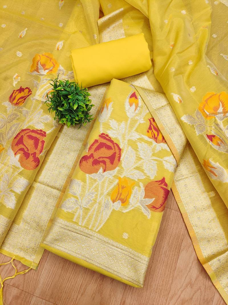 yellow shimmer dress material with zari weaving