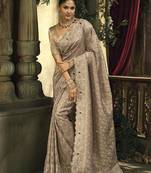 Light brown silk blend wedding saree with cut dana, embroidered, moti and zari work