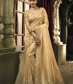 Beige silk blend wedding saree with cut dana, embroidered, moti and zari work