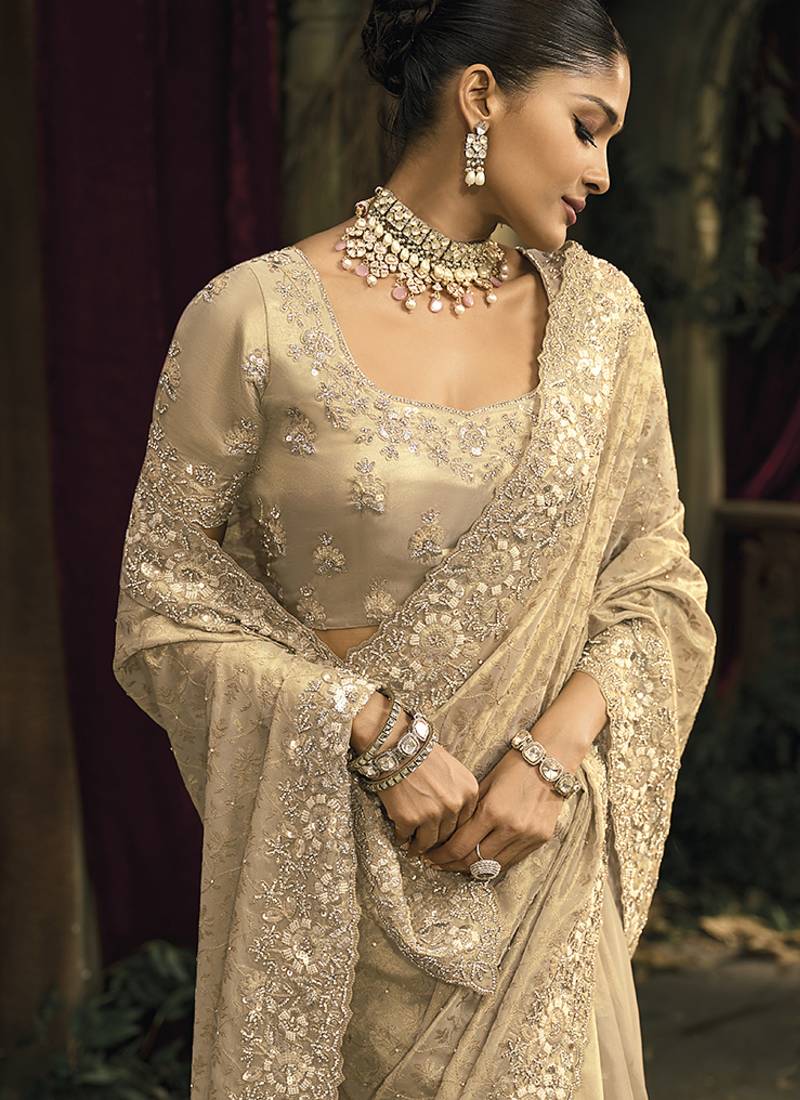 Cream silk blend wedding saree with cut dana, embroidered, moti and zari work