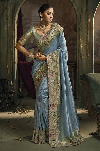 Light blue silk blend wedding saree with cut dana, embroidered, moti and zari work