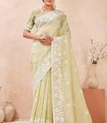 green silk saree with heavy sequin resham embroidery
