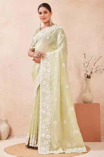 green silk saree with heavy sequin resham embroidery