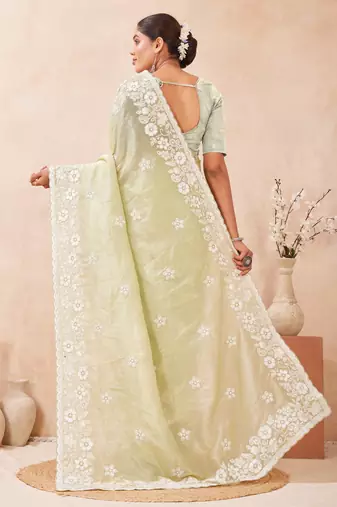 green silk saree with heavy sequin resham embroidery