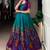 teal green silk festival gown with floral work
