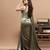 Sage green embroidered velvet saree