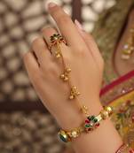 green gold plated kundan hathphool with floral design