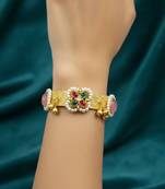 pink gold-plated kundan hathphool with floral design