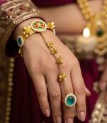 mint gold-plated kundan hathphool with floral design