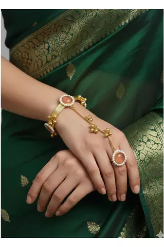 pink gold-plated kundan hathphool with floral design