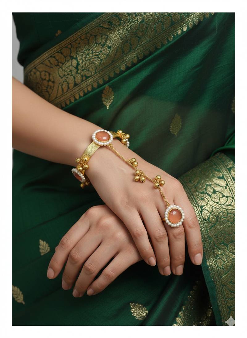 pink gold-plated kundan hathphool with floral design