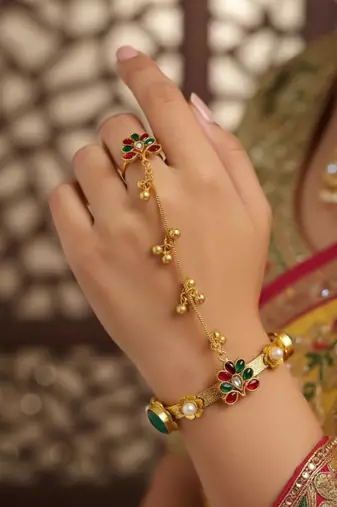 mint gold-plated kundan hathphool with floral work