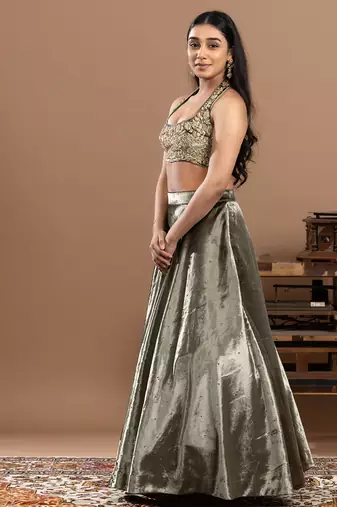 sage green velvet lehenga with embroidered work