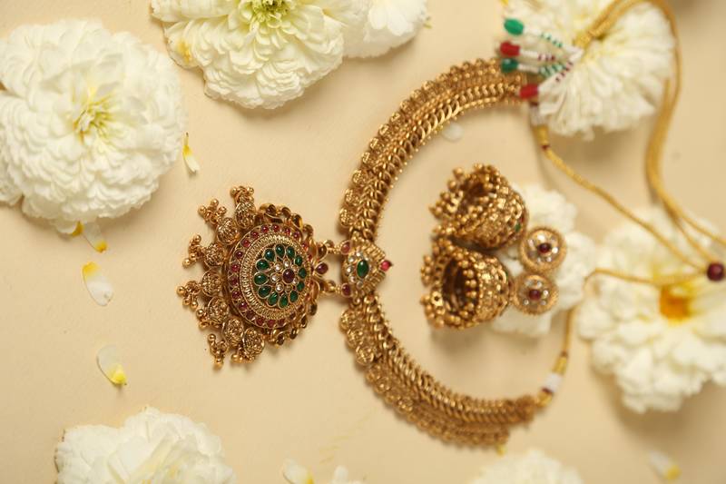 gold necklace set with jhumka earrings