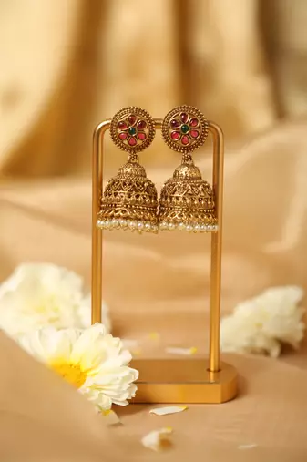 traditional gold jhumka earrings with pearl drops