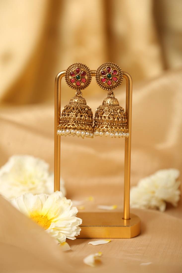 traditional gold jhumka earrings with pearl drops
