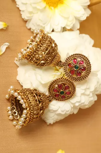 gold plated jhumka earrings with pearl drop design