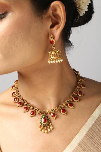 gold necklace with matching earrings 